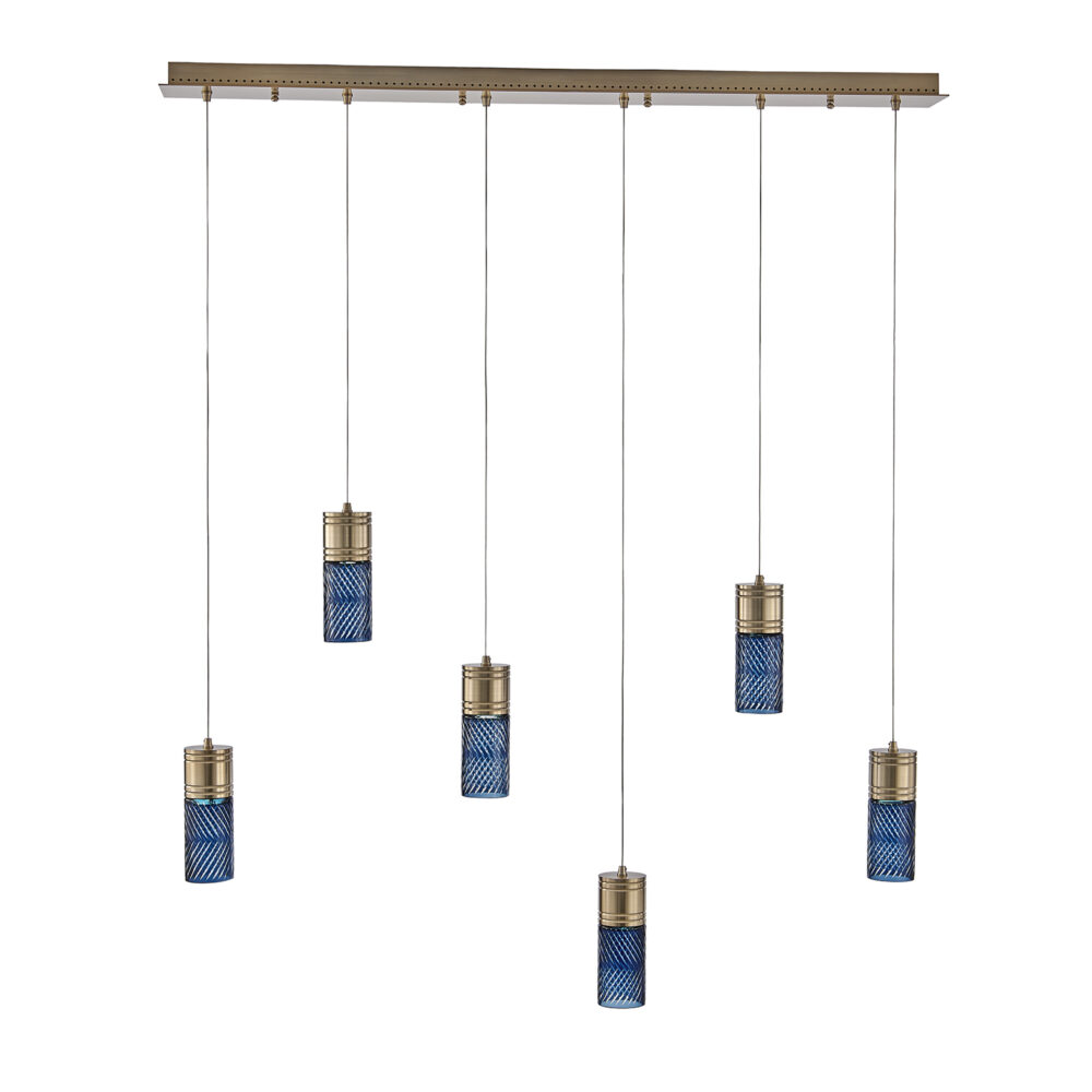 Linear pendant over an island in Winter Brass